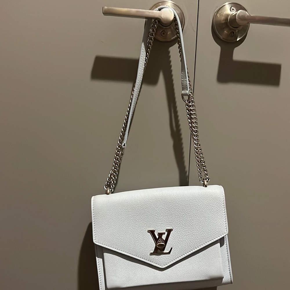 Louis Vutton Baby blue bag with box and bag.